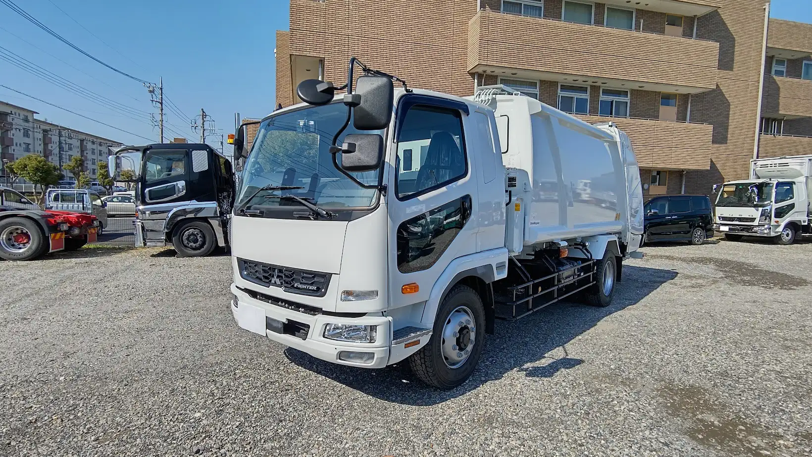 三菱 ファイター 中型/増トン パッカー車 プレス式 ベッド の中古トラック【車両No.159706】