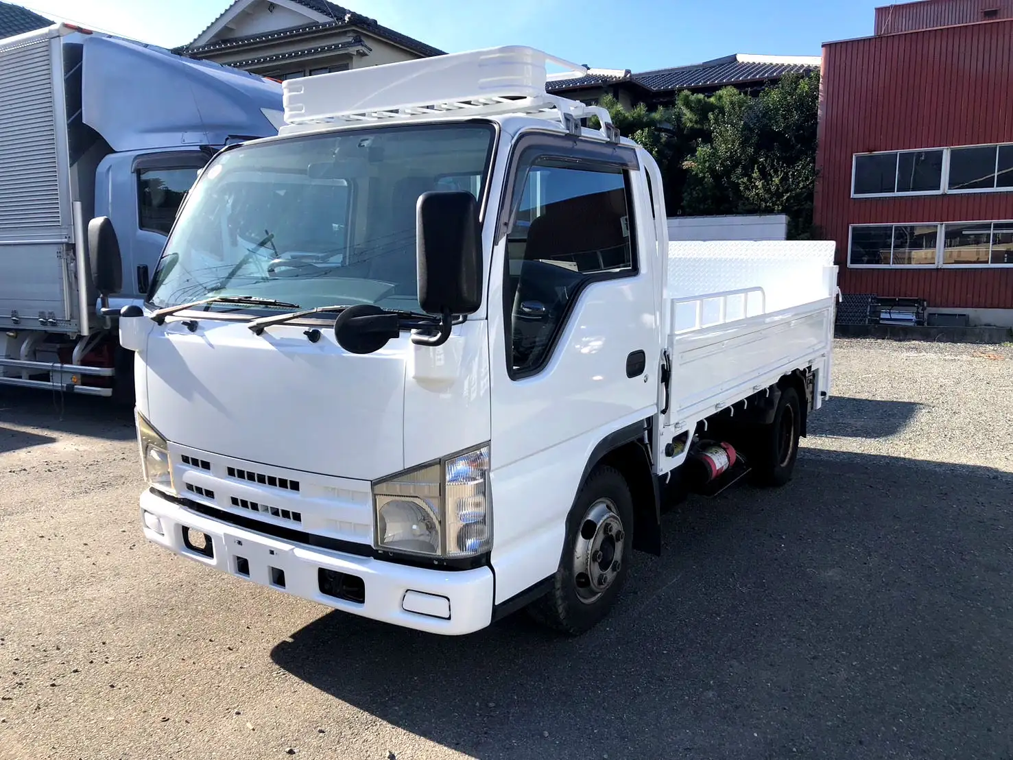いすゞ エルフ 小型 平ボディ パワーゲート BKG-NJR85A の中古トラック【車両No.177648】